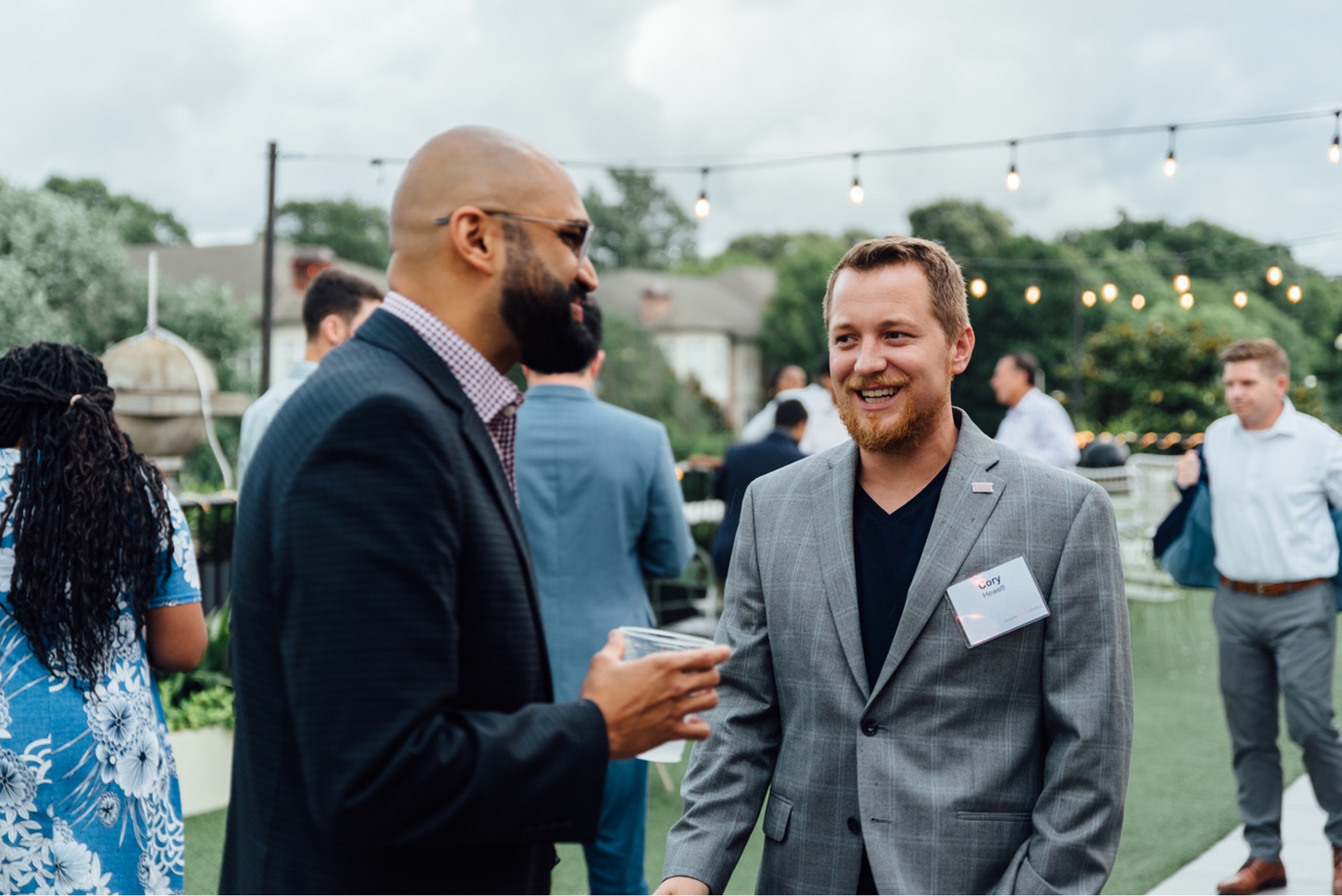 Corey Hewitt, cofounder of Gimme Vending, laughs as he mingles at an outdoor event.&nbsp;
