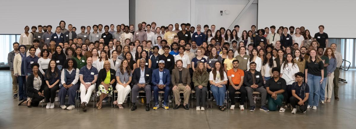 large group of people posing in group photo fashion